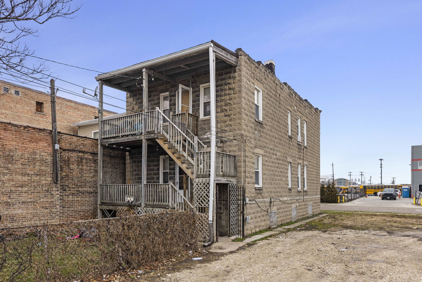 910 St Charles Road Maywood, IL 60153 - Photo 12 of 13 a front view of a house with a yard