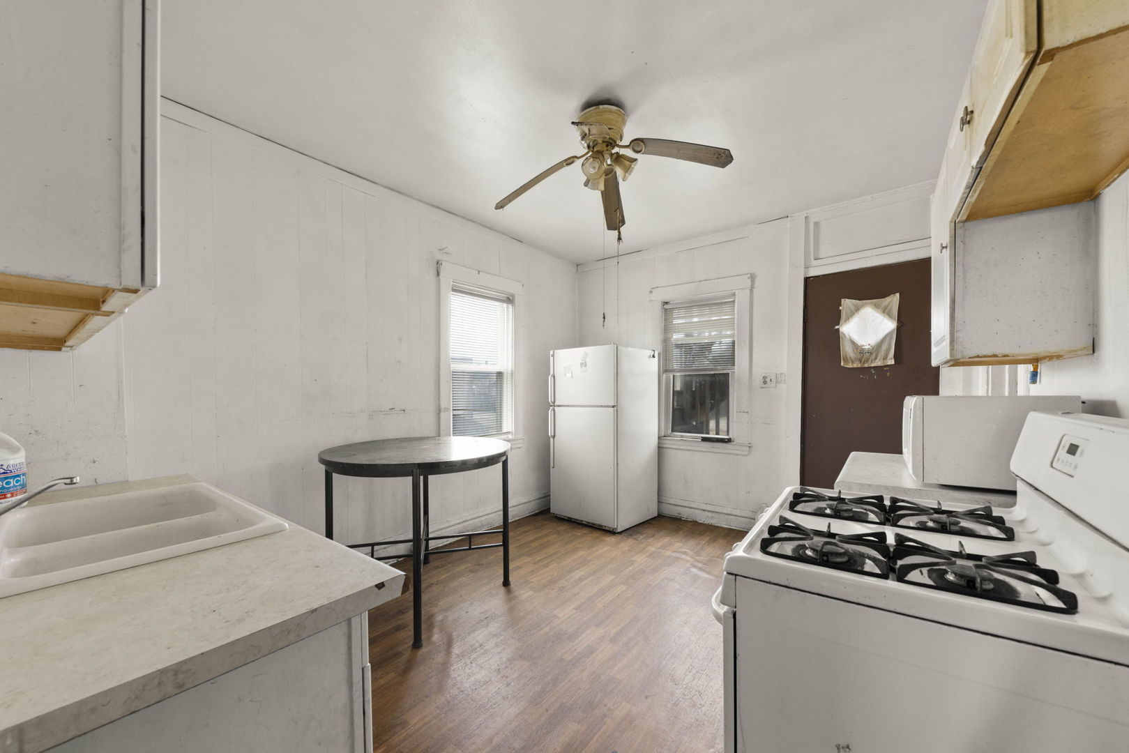 910 St Charles Road Maywood, IL 60153 - Photo 3 of 13 a living room with furniture and wooden floor