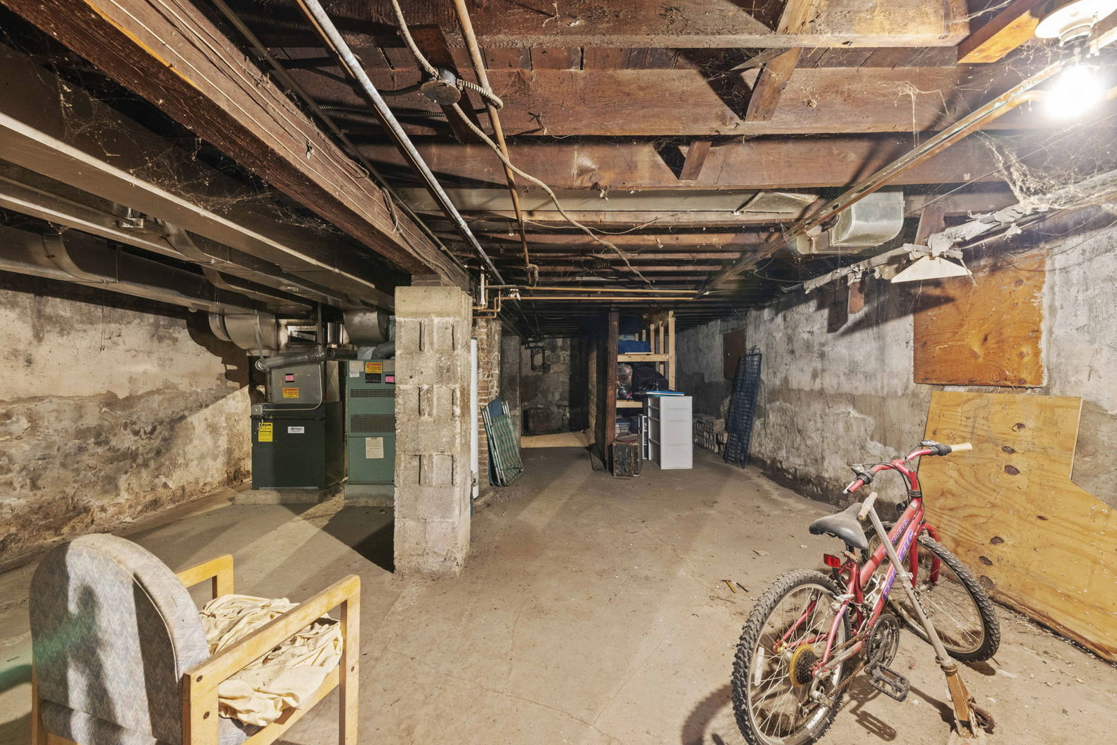 910 St Charles Road Maywood, IL 60153 - Photo 10 of 13 a view of an empty room with wooden floor
