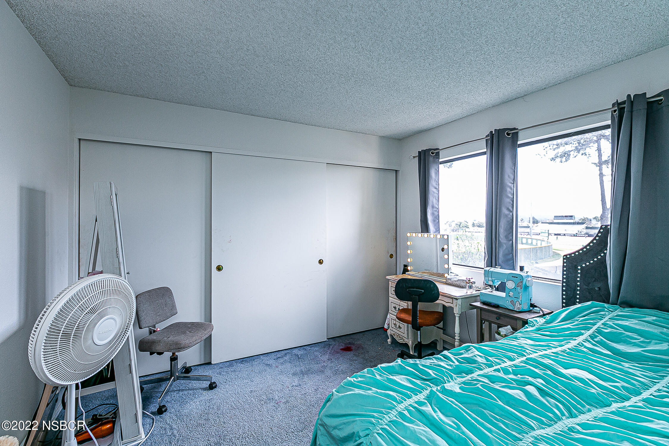 1210 East Foster Road, Unit B Santa Maria, CA 93455 - Photo 20 of 30 a bedroom with bed and a window