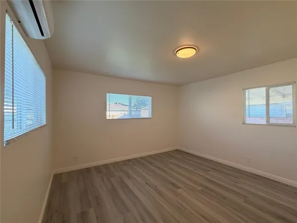 a room with table and chairs