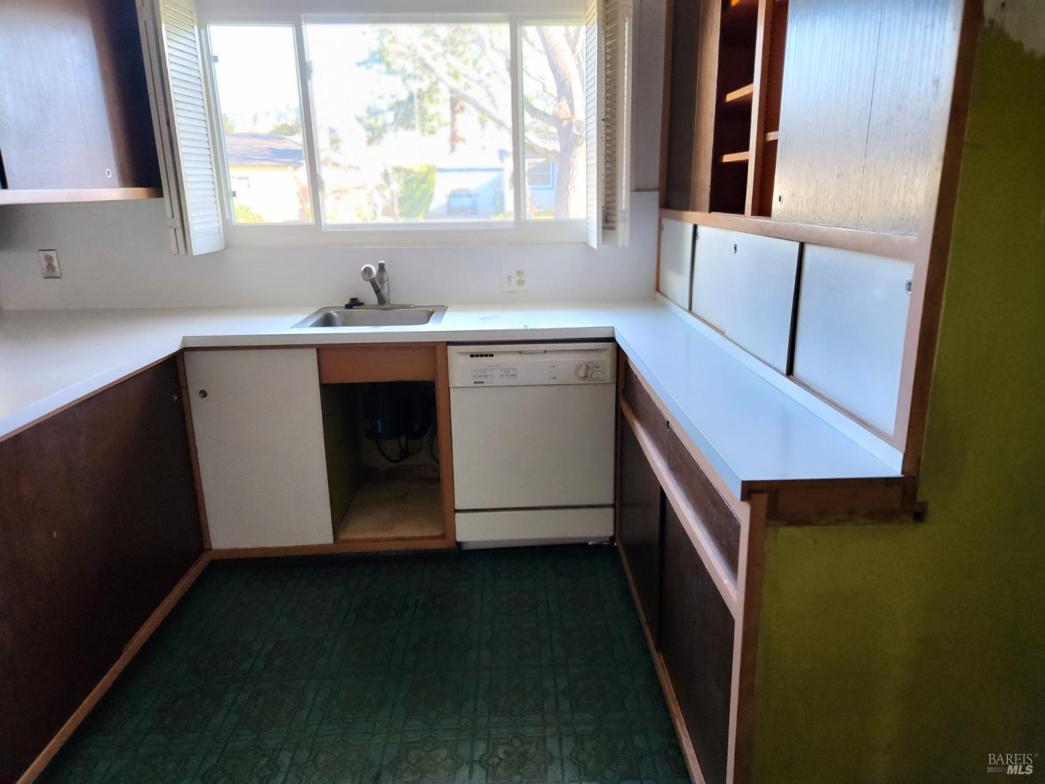 1644 Julianne Place Santa Rosa, CA 95404 - Photo 3 of 4 a bathroom with a sink and a window