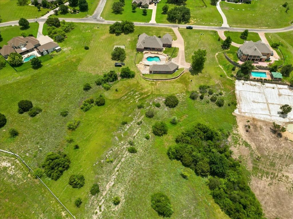120 Trail Ridge Weatherford, TX 76087 - Photo 3 of 37 View of house and surroundingn properties.