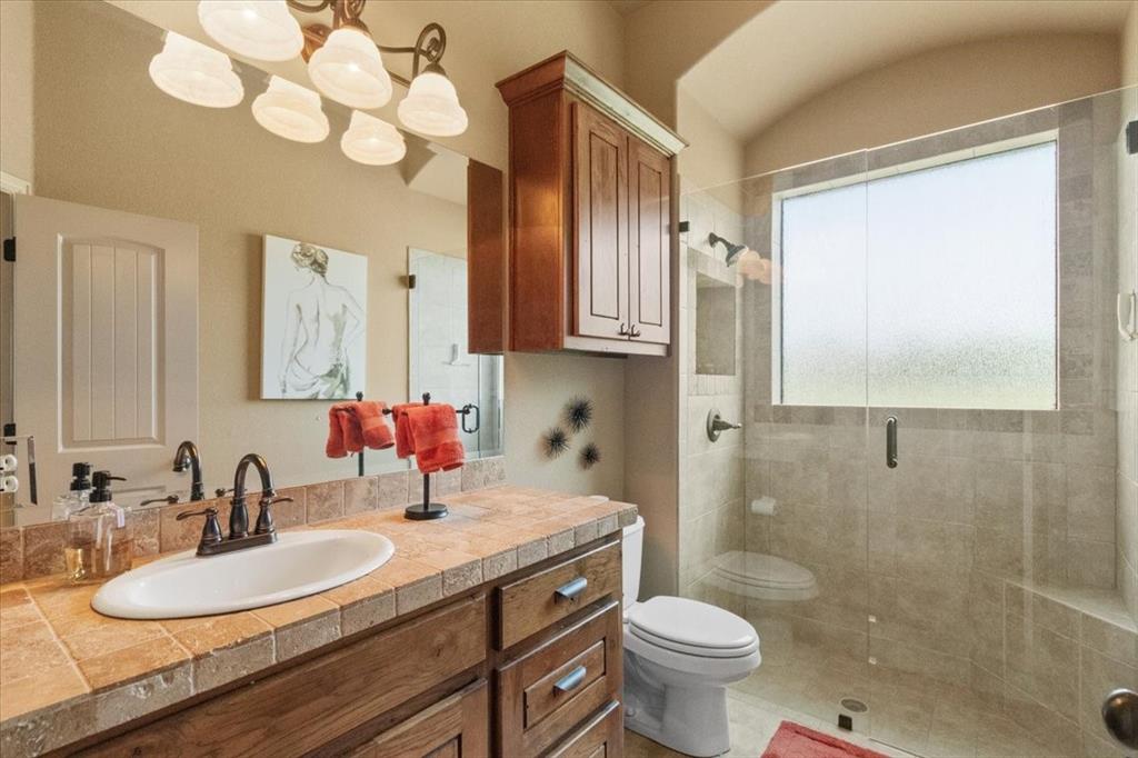 120 Trail Ridge Weatherford, TX 76087 - Photo 35 of 37 Hall bathroom across from 4th bedroom urrently used as study with frameless glass shower doors