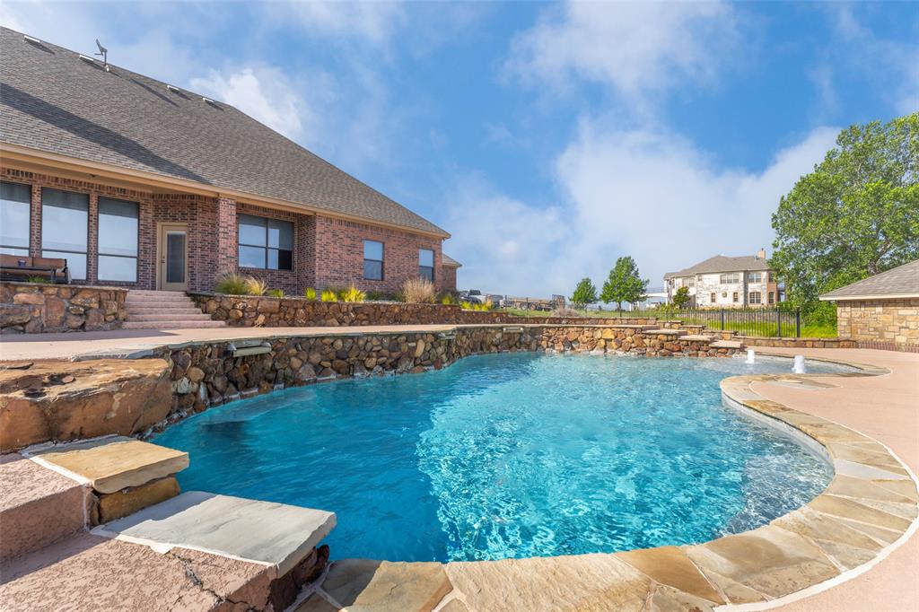 120 Trail Ridge Weatherford, TX 76087 - Photo 5 of 37 View of swimming pool with a patio
