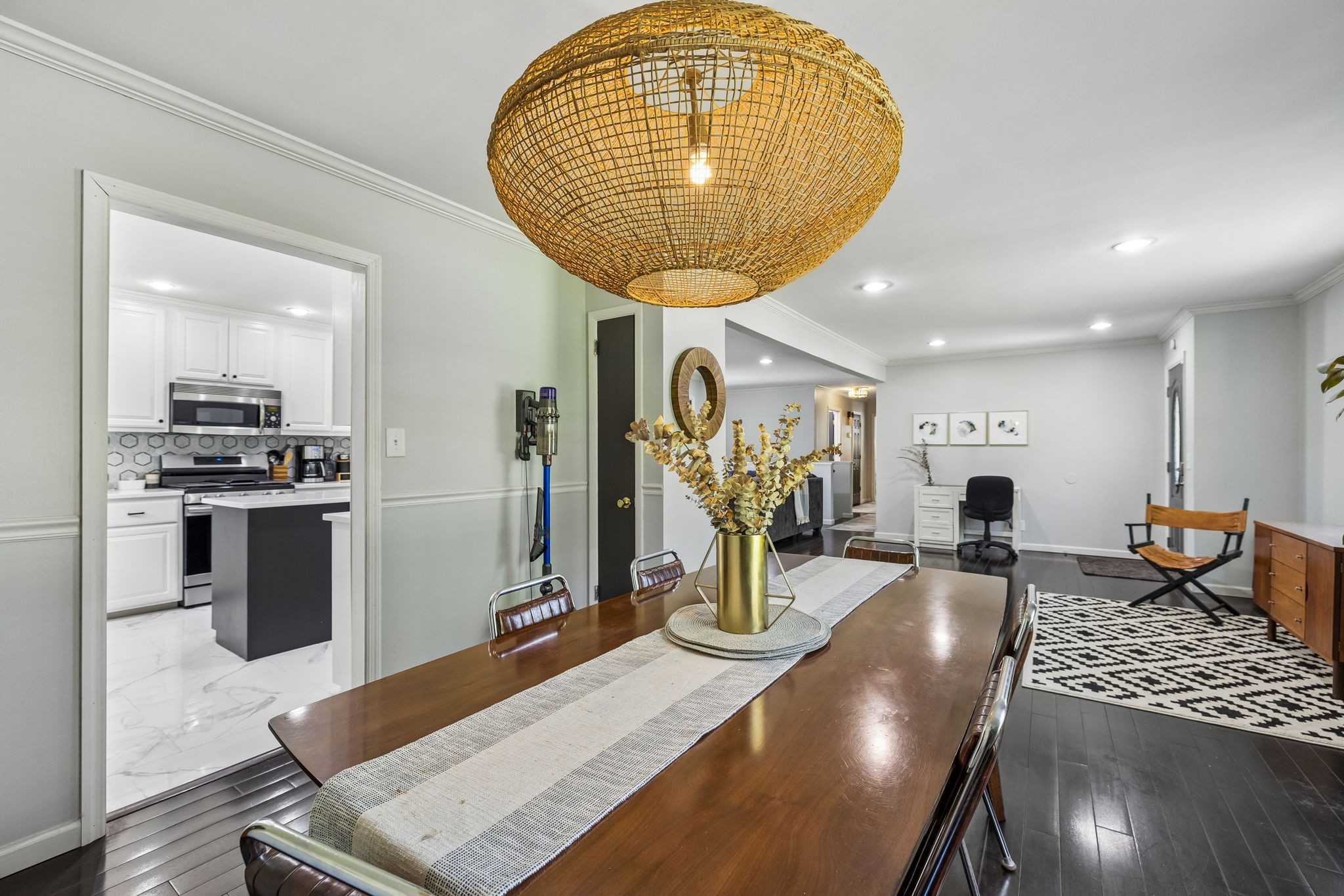 518 Ridgemont Drive Dickson, TN 37055 - Photo 14 of 67 a living room with furniture a flat screen tv and a chandelier