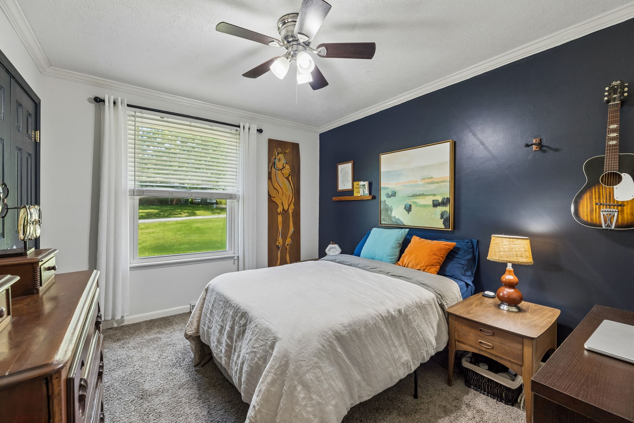 518 Ridgemont Drive Dickson, TN 37055 - Photo 21 of 67 a bed room with a bed and a chandelier