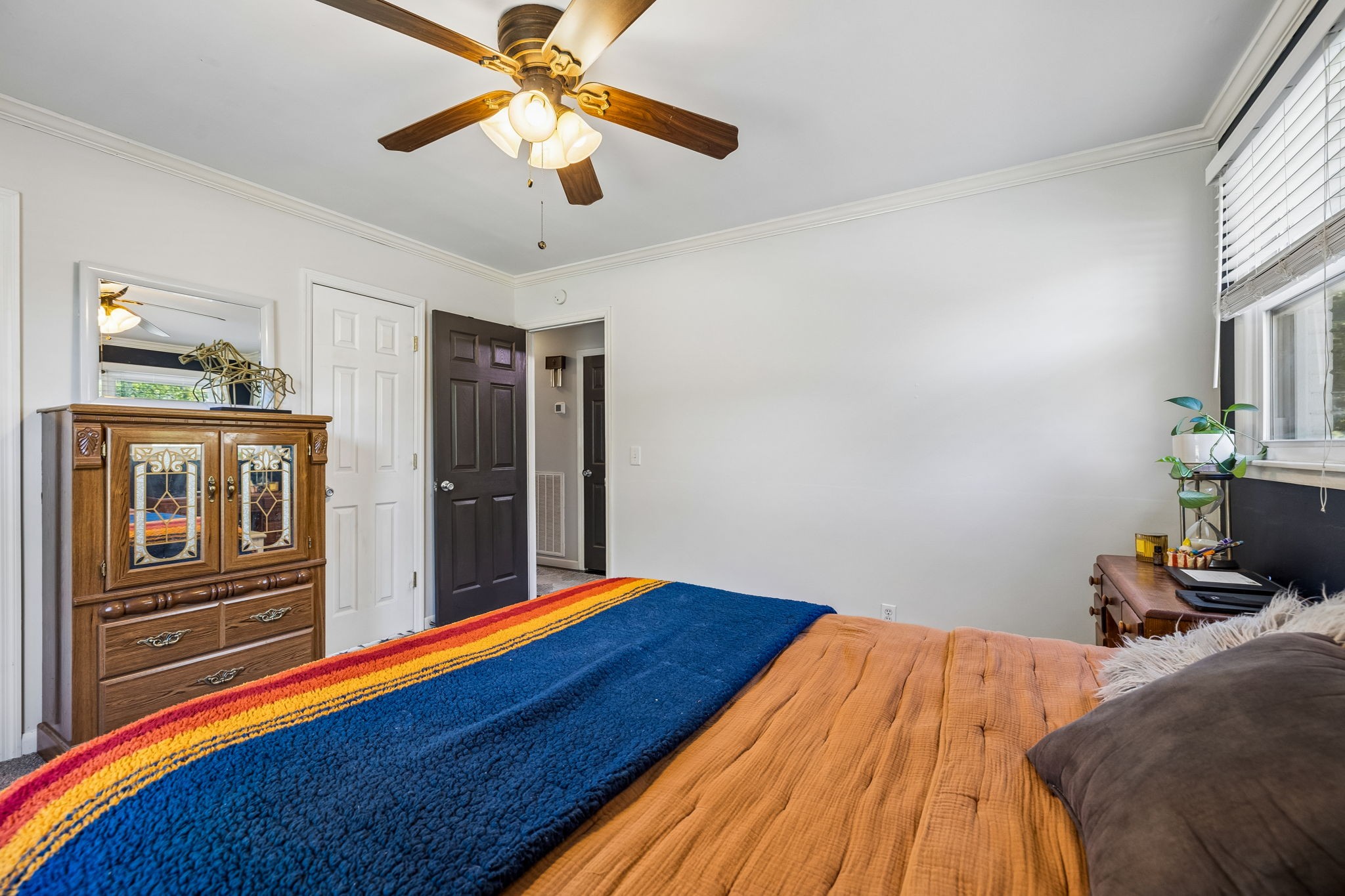 518 Ridgemont Drive Dickson, TN 37055 - Photo 28 of 67 a bed room with a bed and a ceiling fan