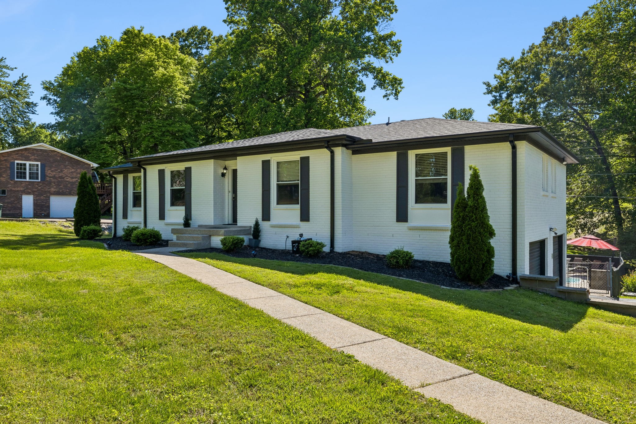 518 Ridgemont Drive Dickson, TN 37055 - Photo 3 of 67 a front view of a house with a yard