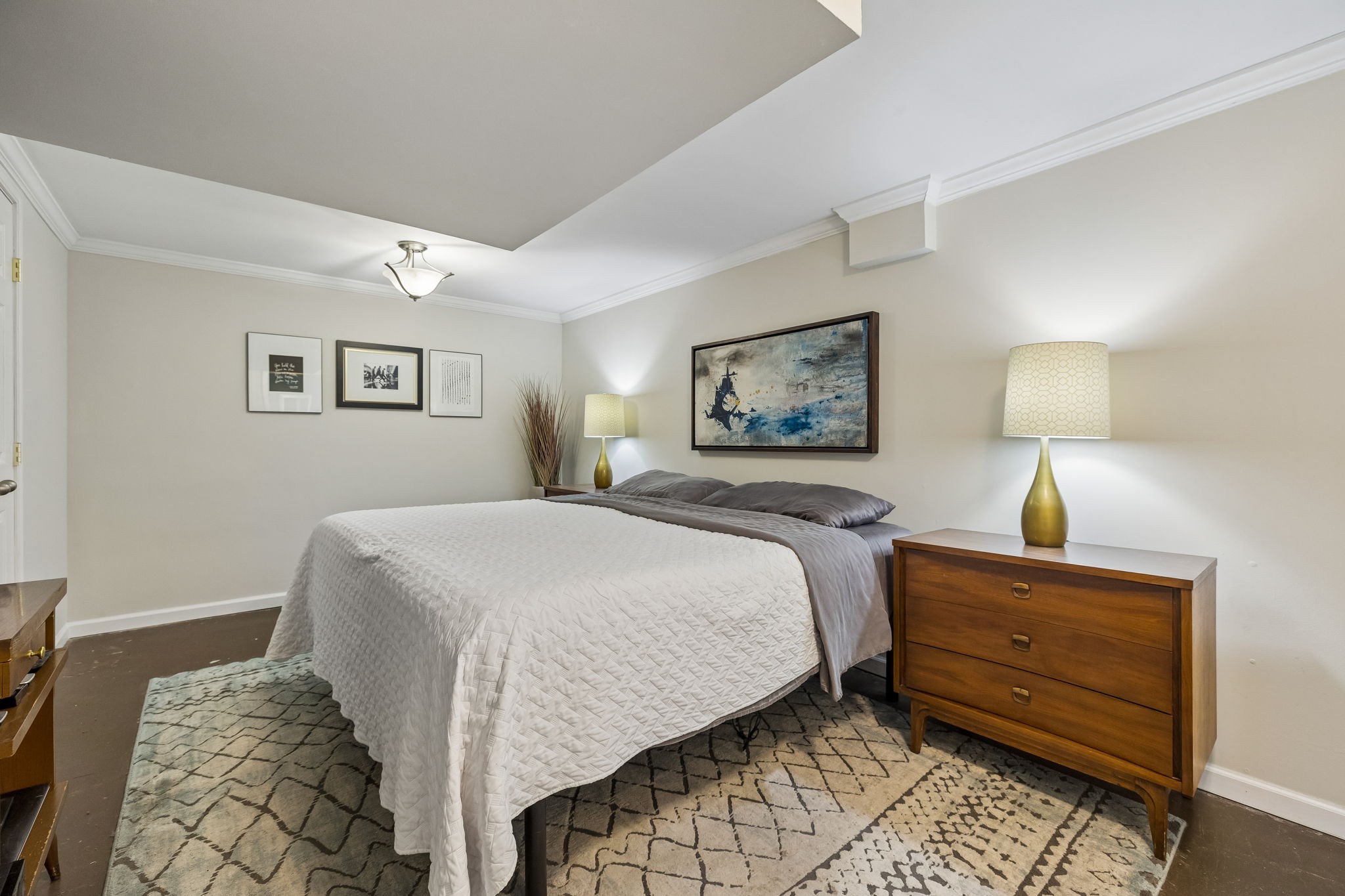 518 Ridgemont Drive Dickson, TN 37055 - Photo 38 of 67 a bedroom with a bed and a painting on the wall