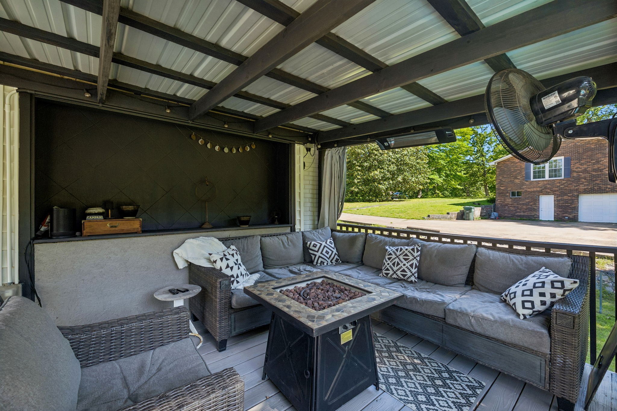 518 Ridgemont Drive Dickson, TN 37055 - Photo 48 of 67 a outdoor living space with furniture and a fireplace