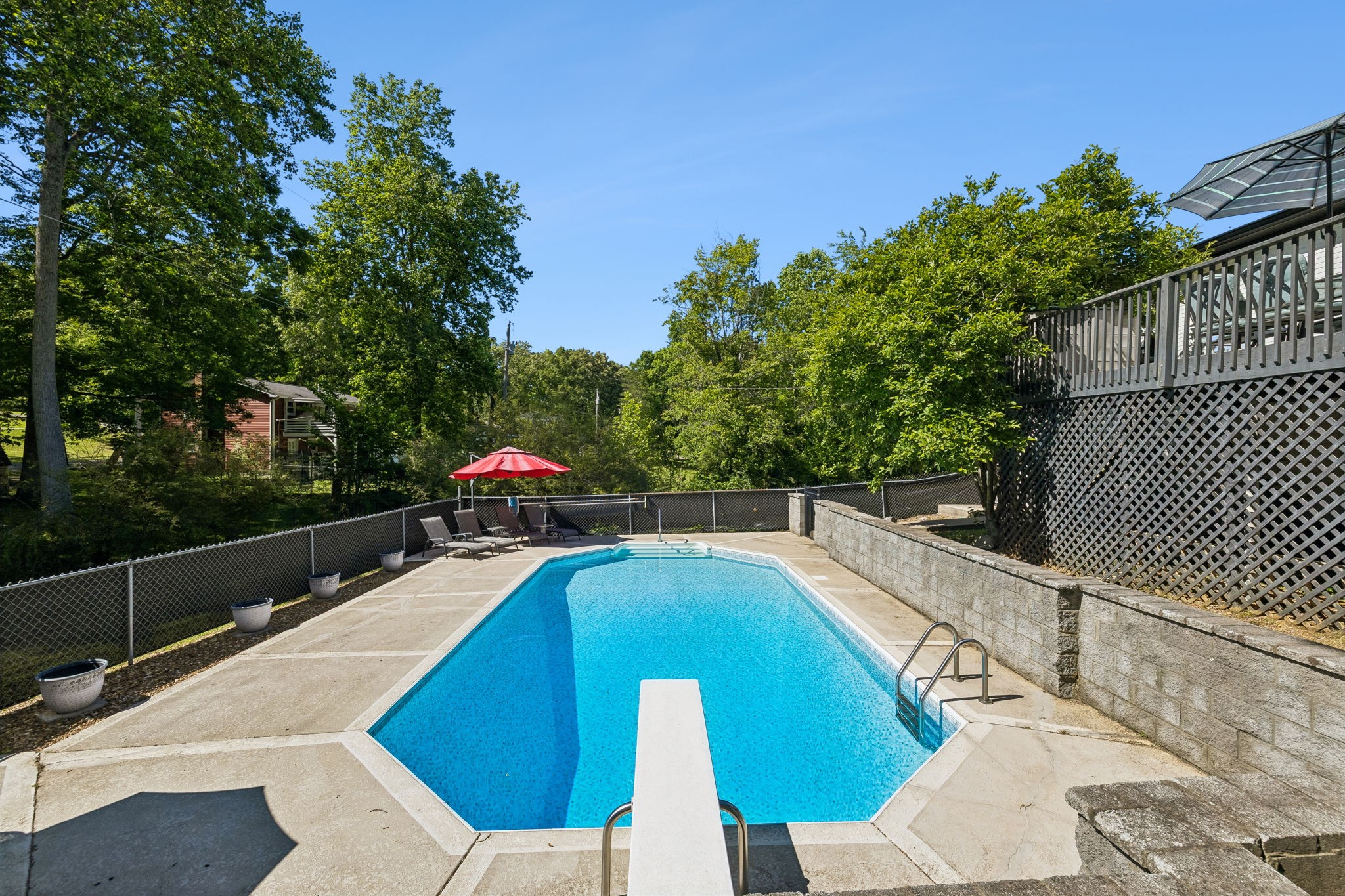 518 Ridgemont Drive Dickson, TN 37055 - Photo 54 of 67 a swimming pool with an outdoor seating