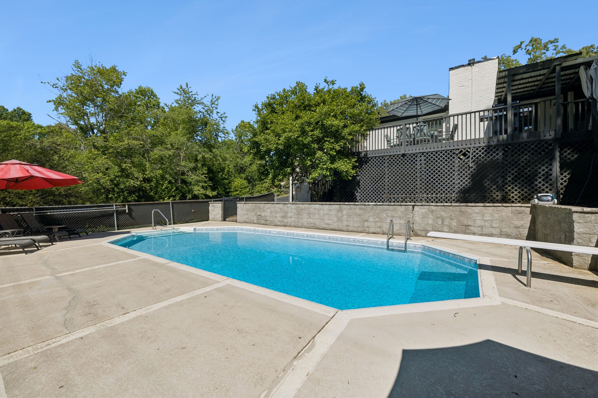 518 Ridgemont Drive Dickson, TN 37055 - Photo 56 of 67 a view of a swimming pool with a patio