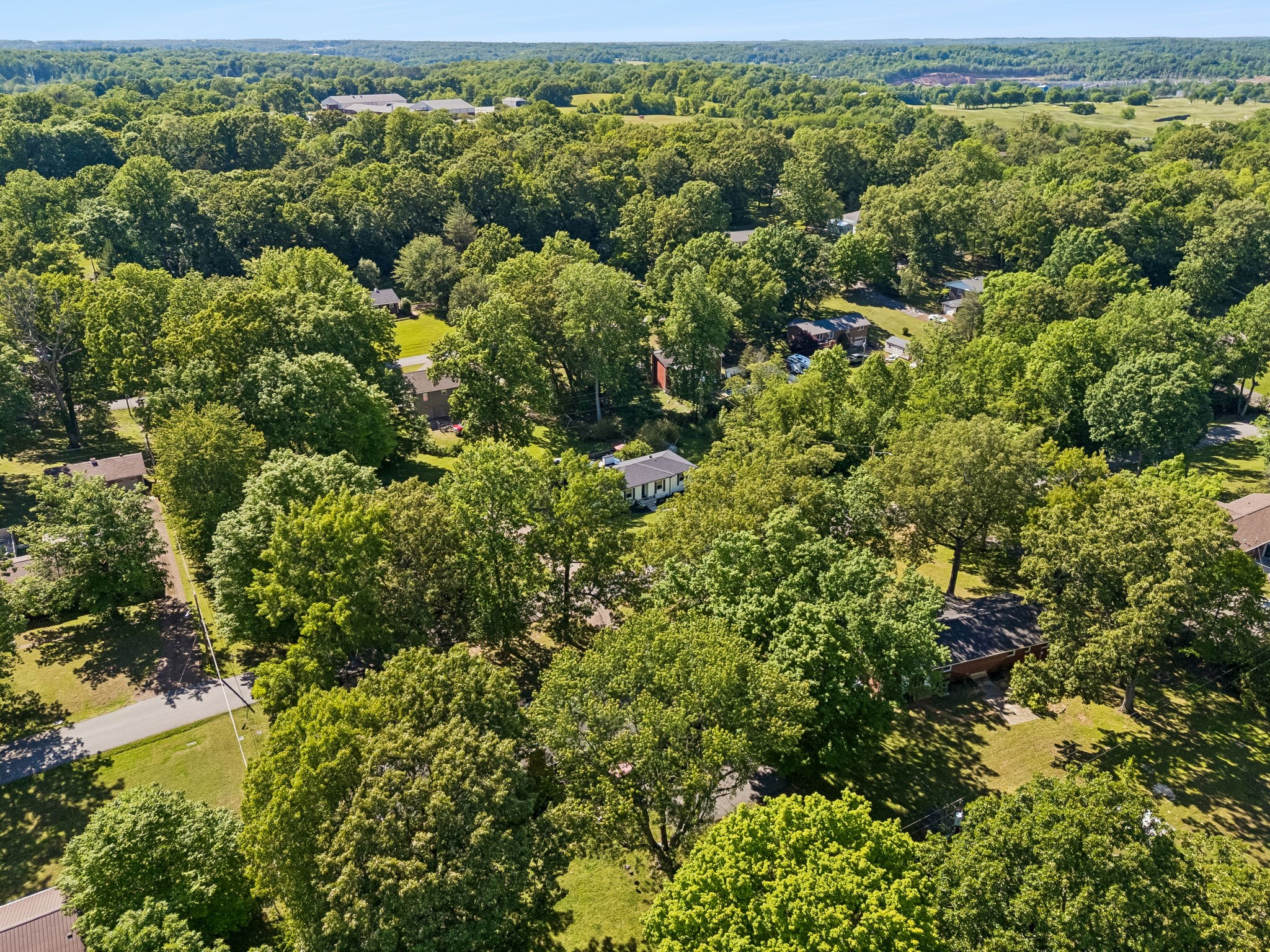 518 Ridgemont Drive Dickson, TN 37055 - Photo 62 of 67 an aerial view of residential houses with outdoor space and trees
