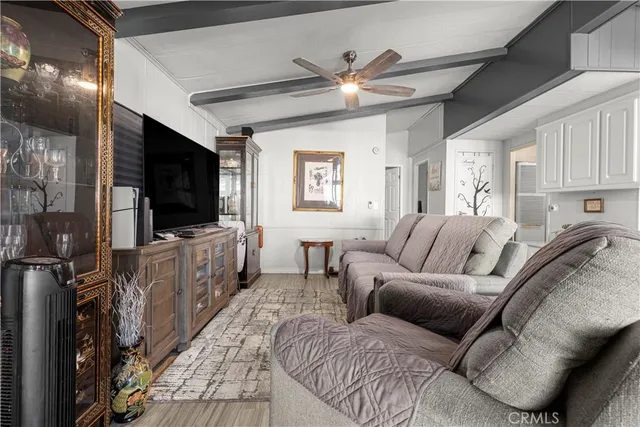 a view of a backyard with sitting area