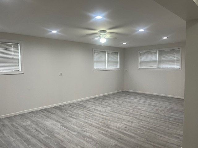 3045 Central Road Glenview, IL 60025 - Photo 13 of 15 an empty room with wooden floor and windows