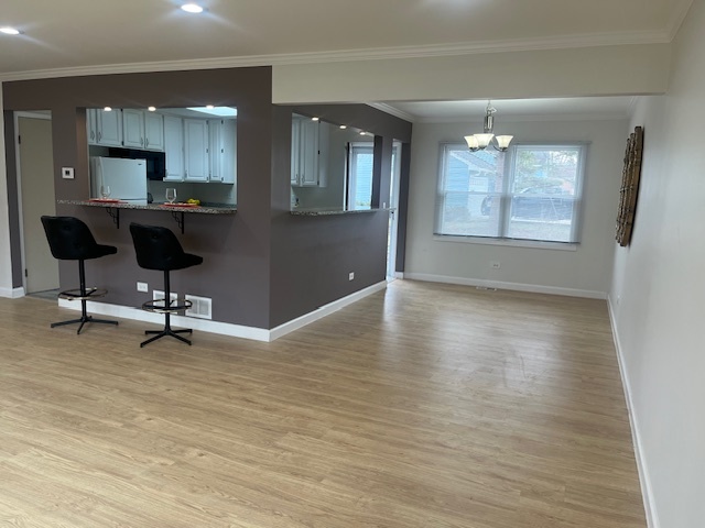 3045 Central Road Glenview, IL 60025 - Photo 4 of 15 a view of a workspace with furniture and a window