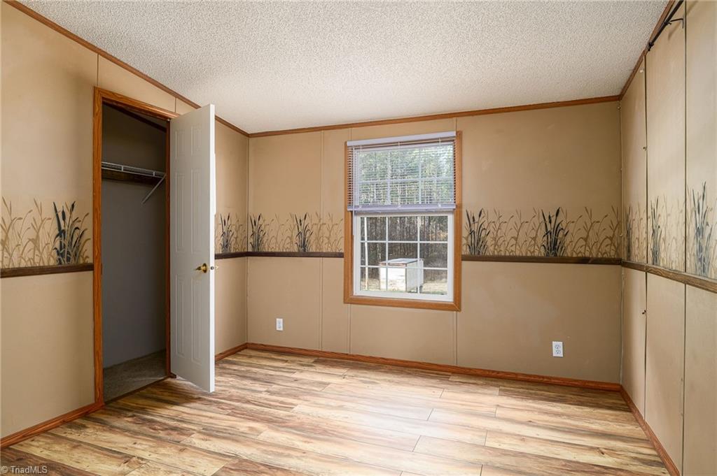 876 Mr Henry Road Mocksville, NC 27028 - Photo 22 of 41 4th bedroom with new LVP flooring