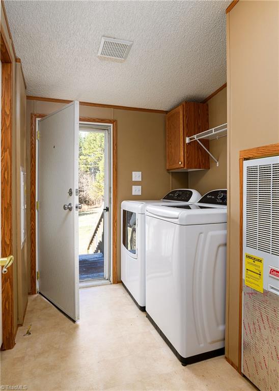 876 Mr Henry Road Mocksville, NC 27028 - Photo 25 of 41 Laundry room with access to back yard!