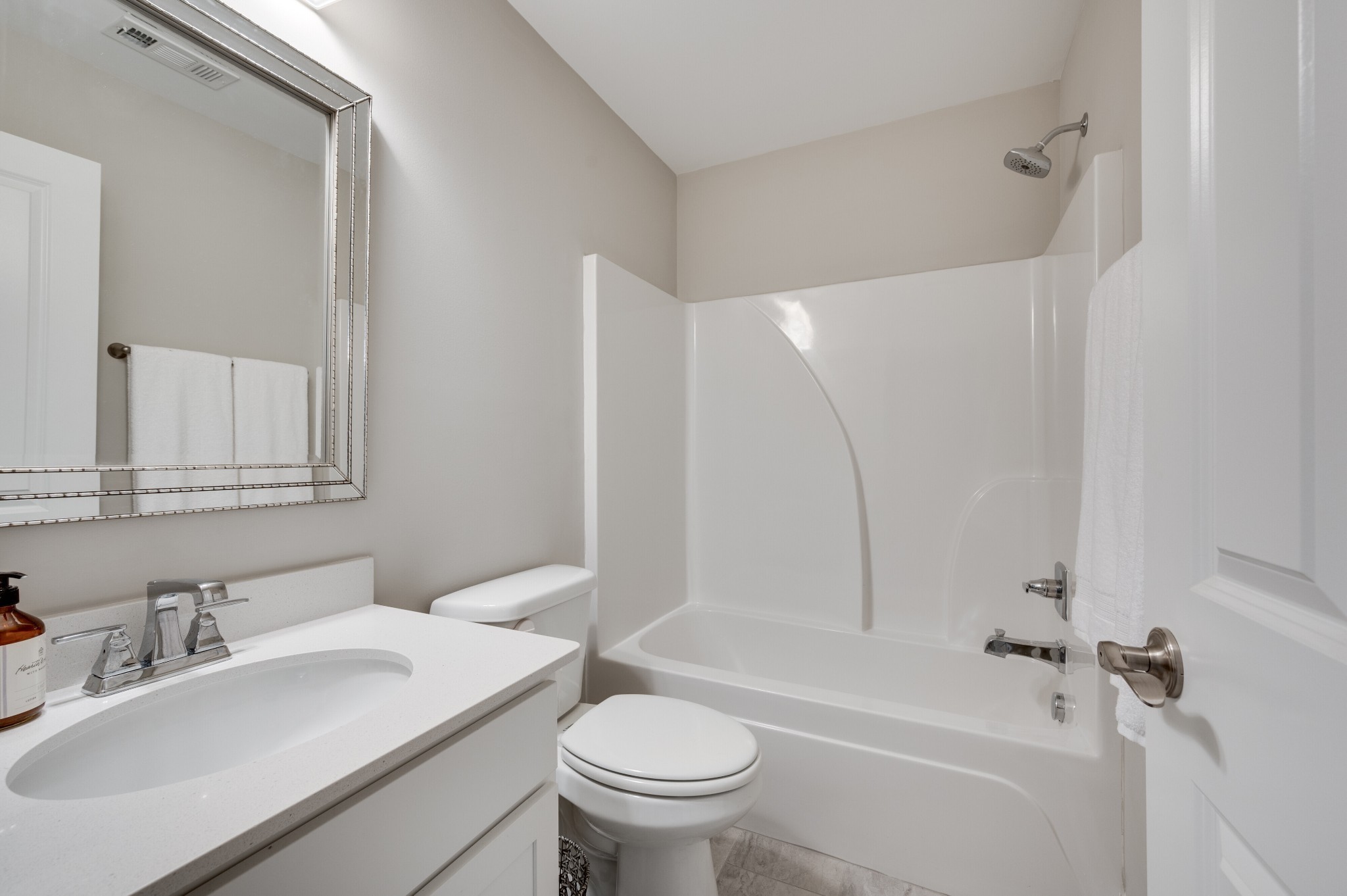 3106 Patcham Drive Nolensville, TN 37135 - Photo 15 of 26 a bathroom with a sink toilet vanity and shower
