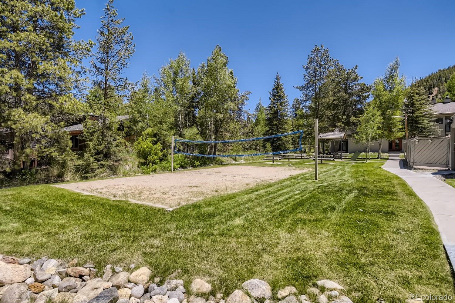1937 Soda Ridge Road, Unit 1153/1154 Dillon, CO 80435 - Photo 15 of 17 a view of swimming pool with a yard