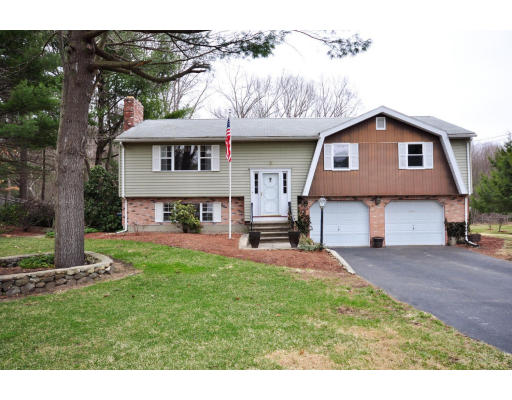6 Donna Road Andover, MA 01810 - Photo 1 of 1 a front view of a house with a garden and yard