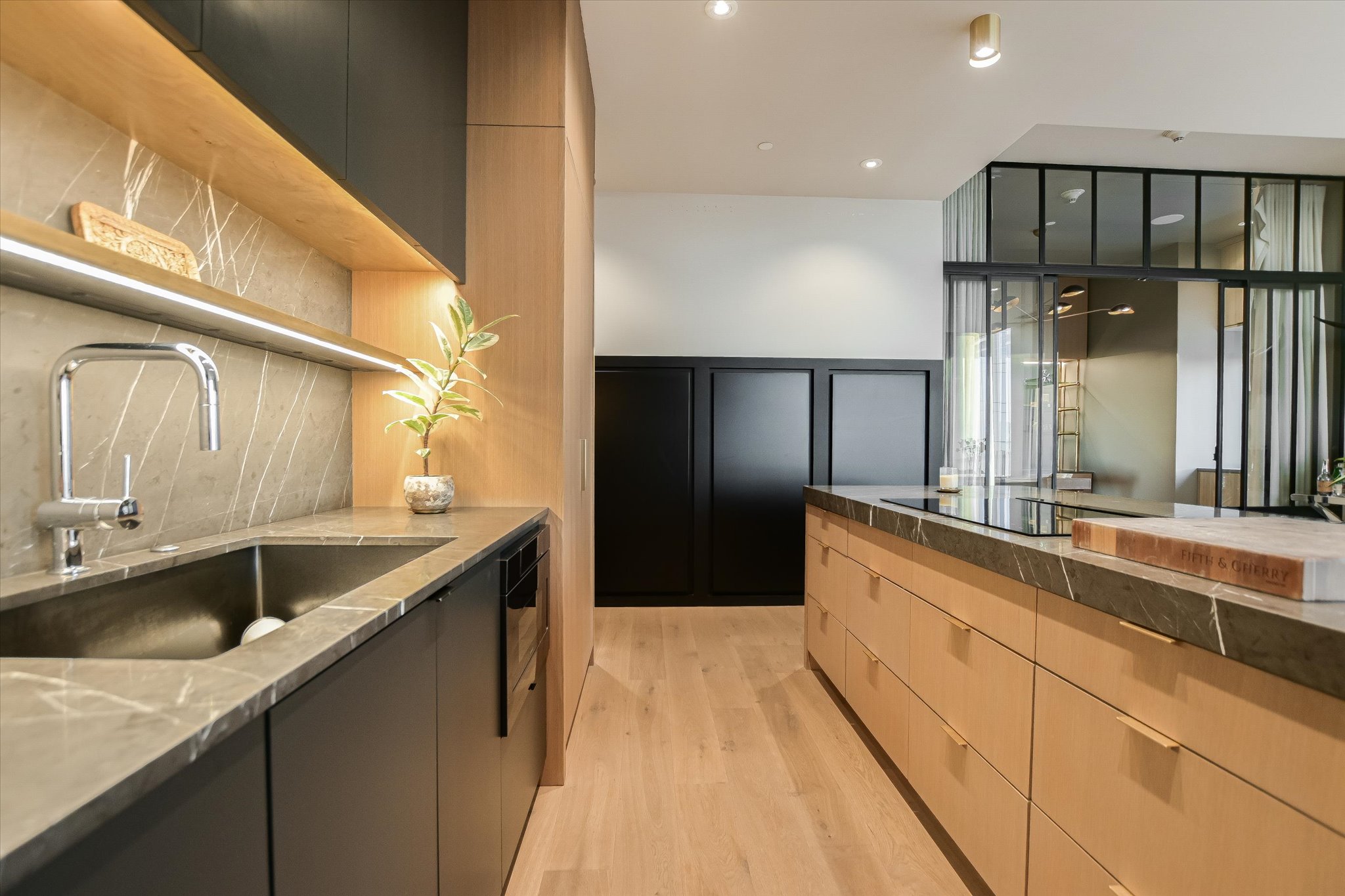 210 Lavaca Street, Unit 3108 Austin, TX 78701 - Photo 18 of 34 a large kitchen with a sink and refrigerator