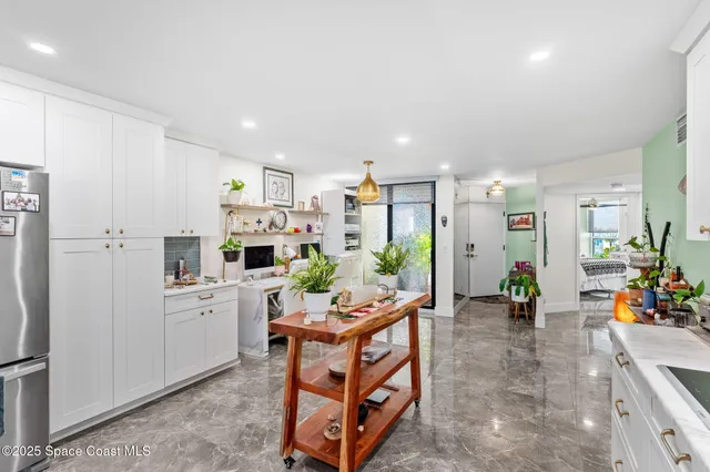 a bedroom with a bed and a cabinets