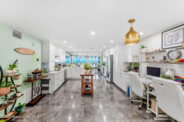a view of a balcony with chairs
