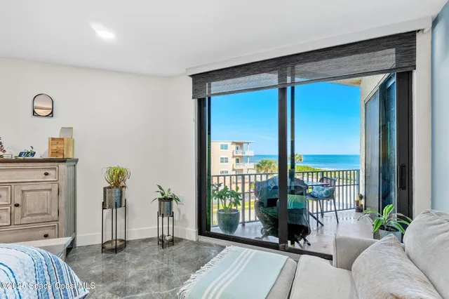 a outdoor living space with furniture and garden view