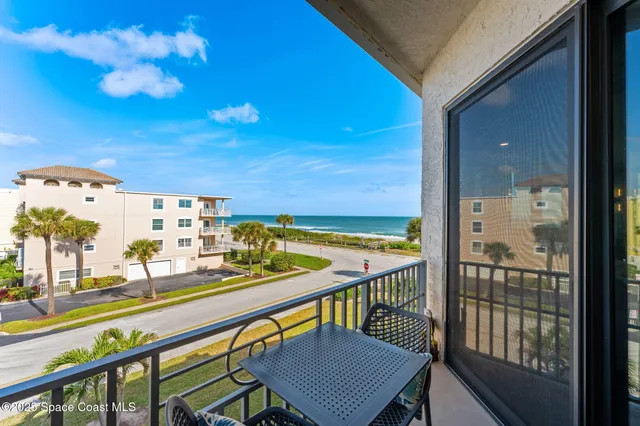 a view of an ocean from a balcony