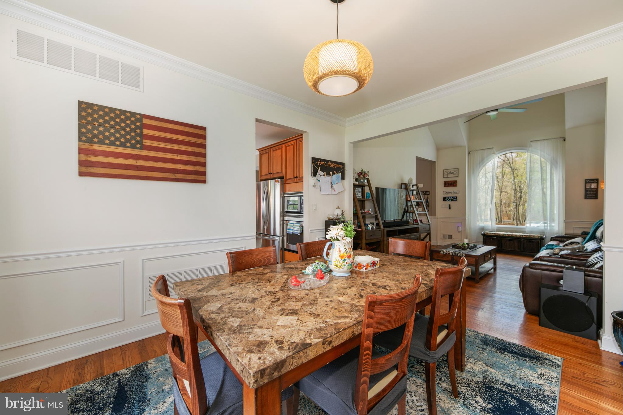 173 West Pleasant Grove Road Jackson, NJ 08527 - Photo 12 of 47 a view of a dining room and hall with furniture