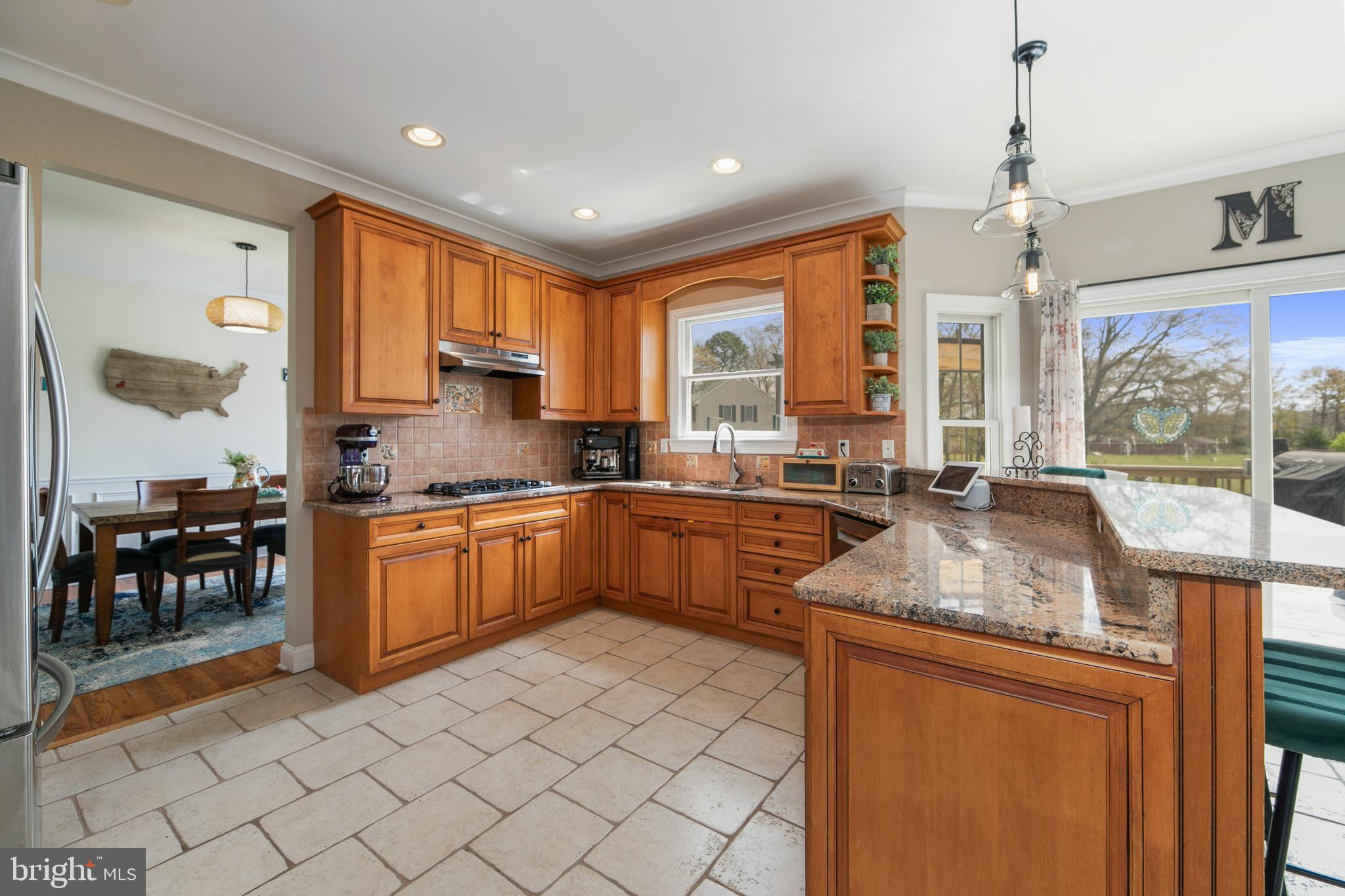 173 West Pleasant Grove Road Jackson, NJ 08527 - Photo 15 of 47 a kitchen with stainless steel appliances granite countertop a stove a sink and a microwave