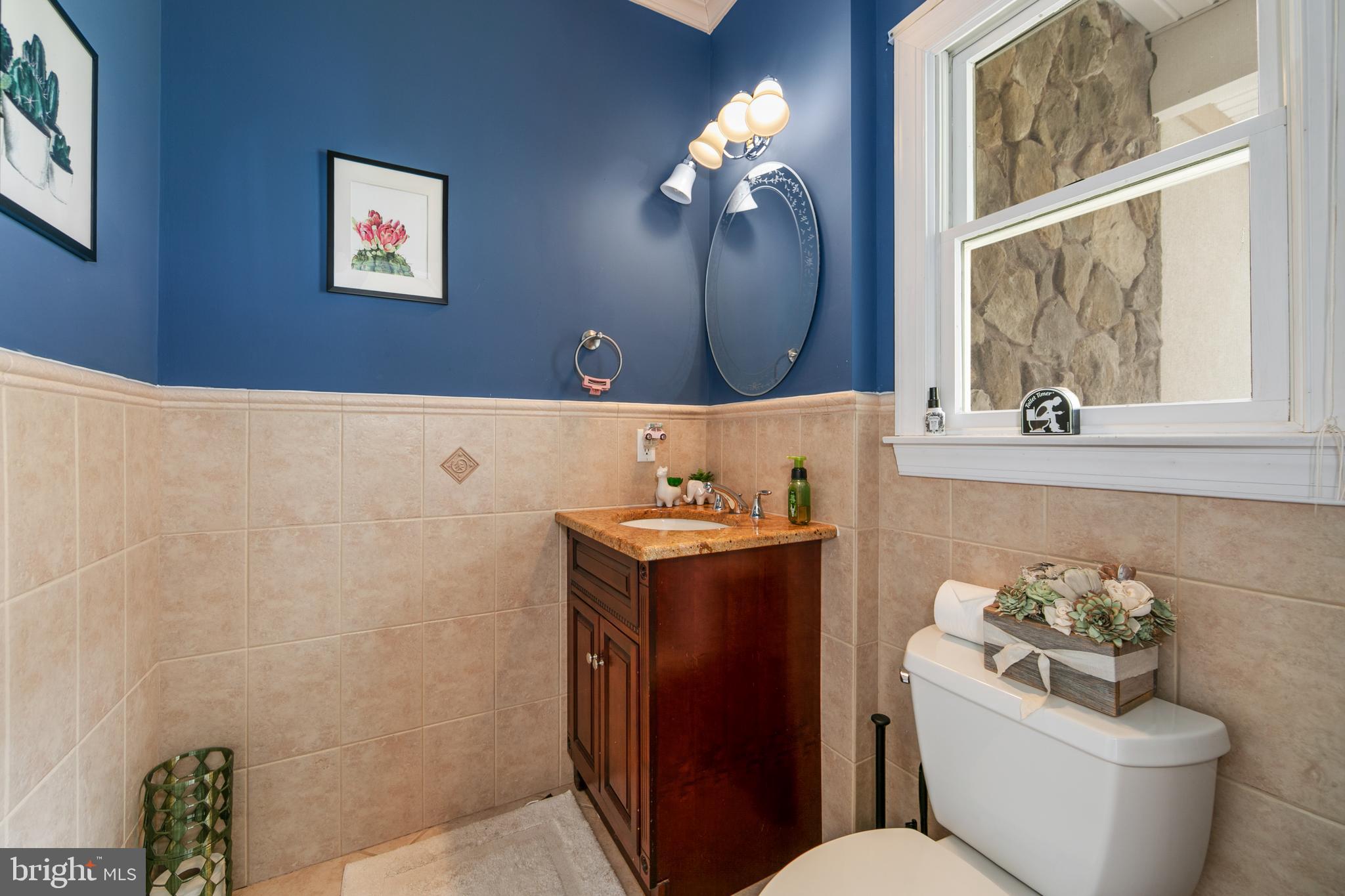 173 West Pleasant Grove Road Jackson, NJ 08527 - Photo 23 of 47 a bathroom with a toilet sink and mirror