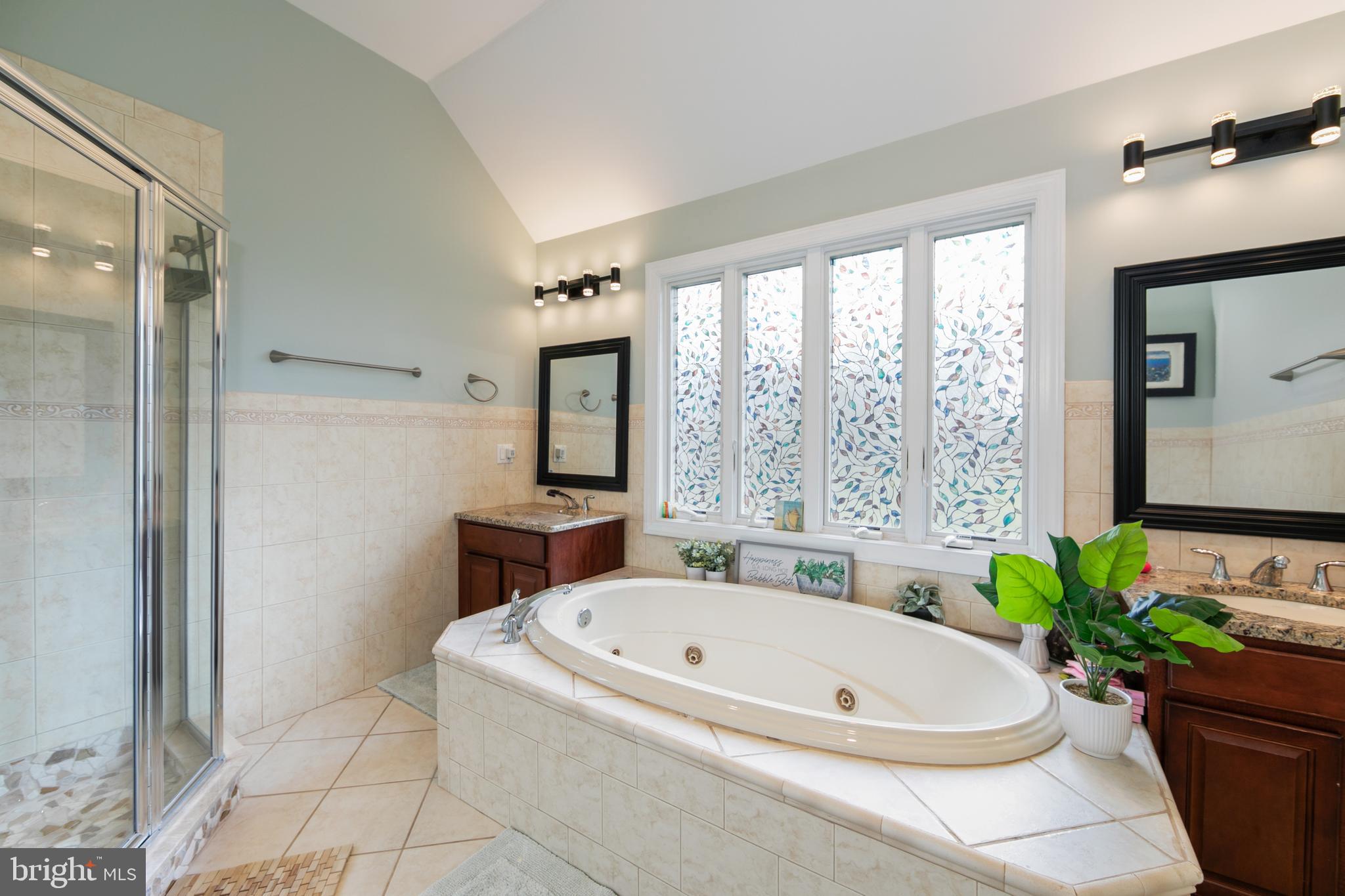 173 West Pleasant Grove Road Jackson, NJ 08527 - Photo 27 of 47 a white bath tub sitting in a bathroom next to a window