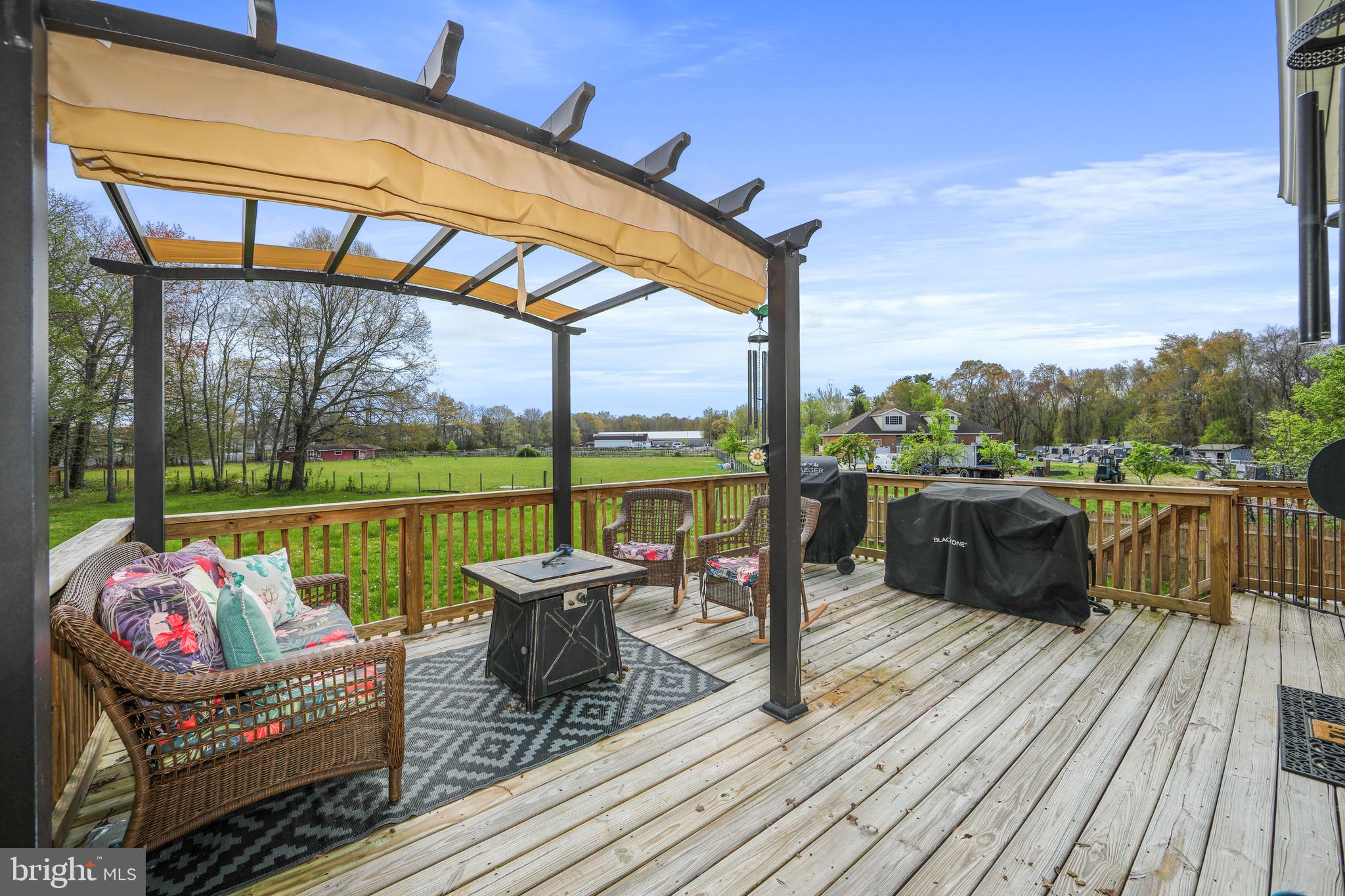 173 West Pleasant Grove Road Jackson, NJ 08527 - Photo 34 of 47 a balcony with furniture and a table