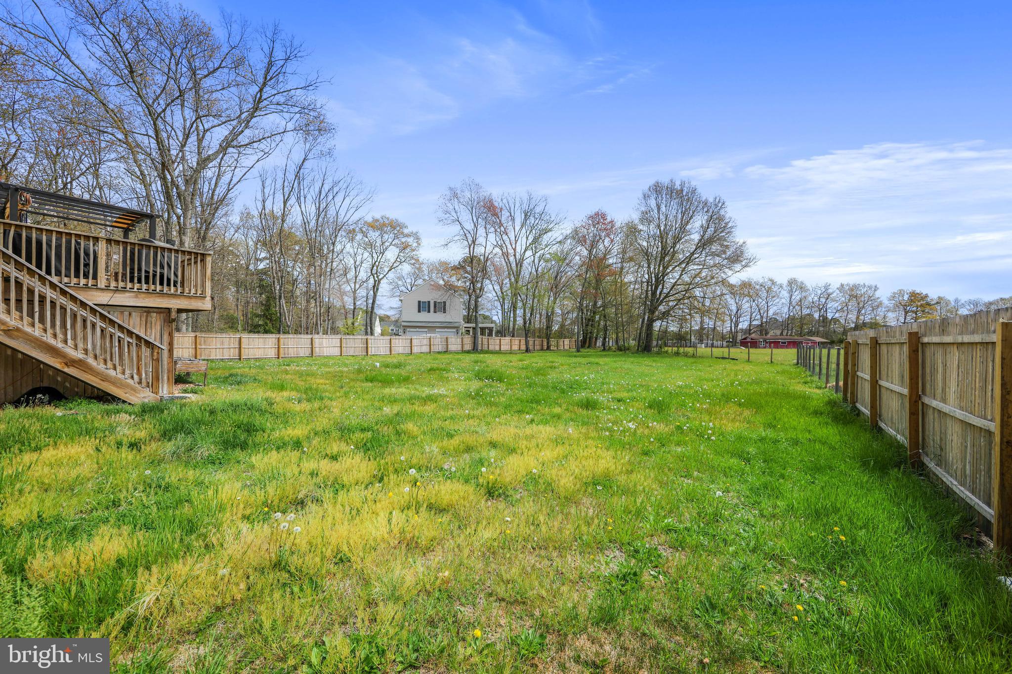 173 West Pleasant Grove Road Jackson, NJ 08527 - Photo 36 of 47 a view of a yard with a house in the background