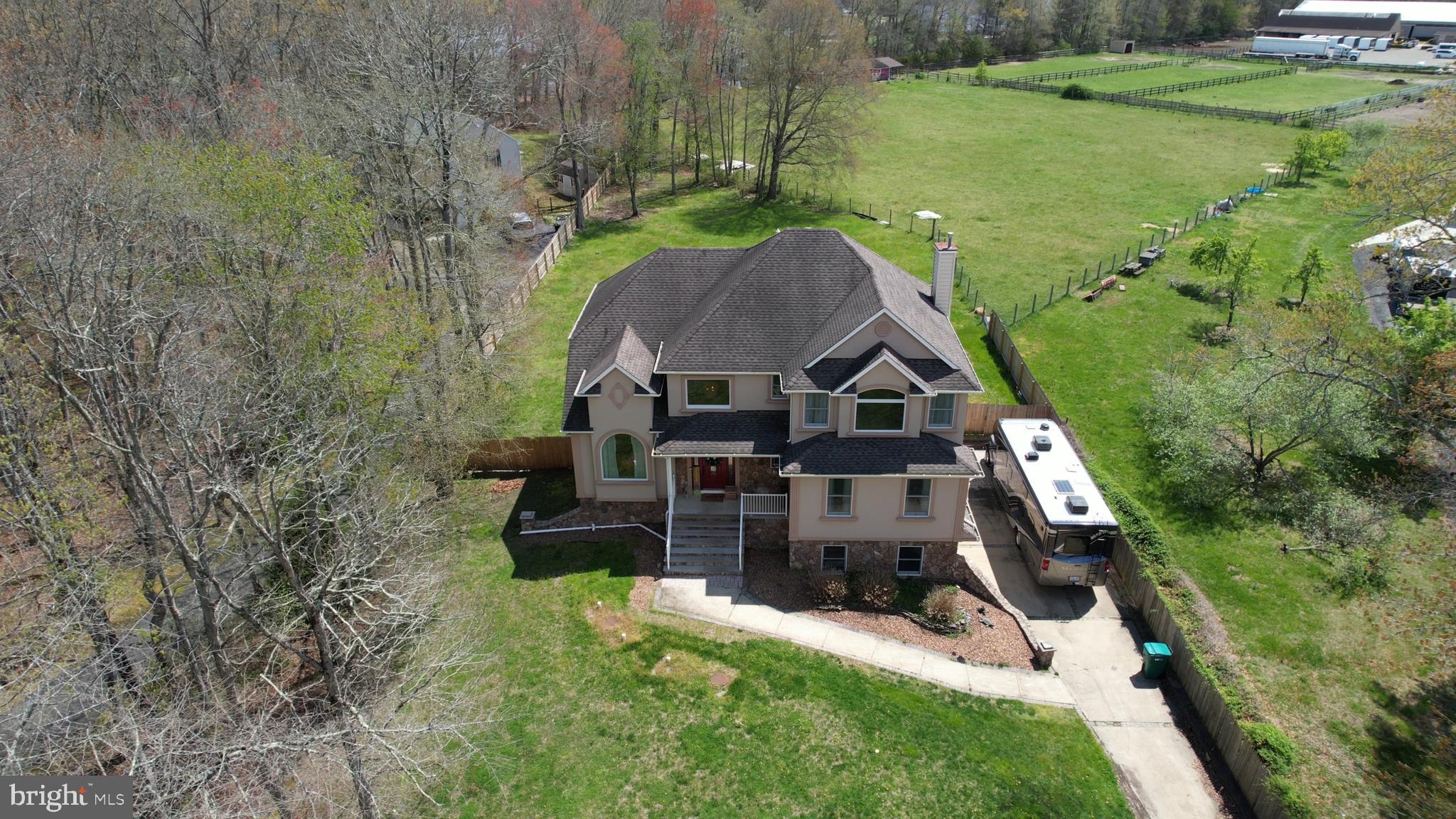 173 West Pleasant Grove Road Jackson, NJ 08527 - Photo 4 of 47 an aerial view of a house