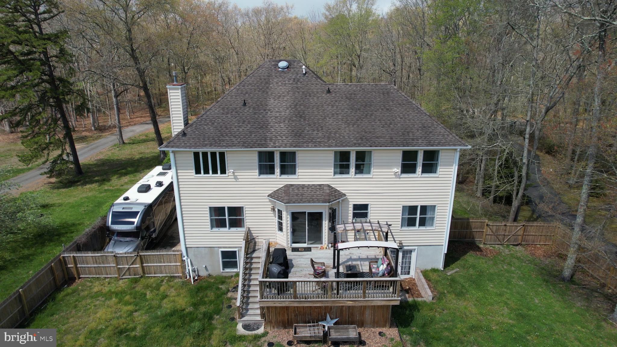 173 West Pleasant Grove Road Jackson, NJ 08527 - Photo 42 of 47 a front view of a house with garden