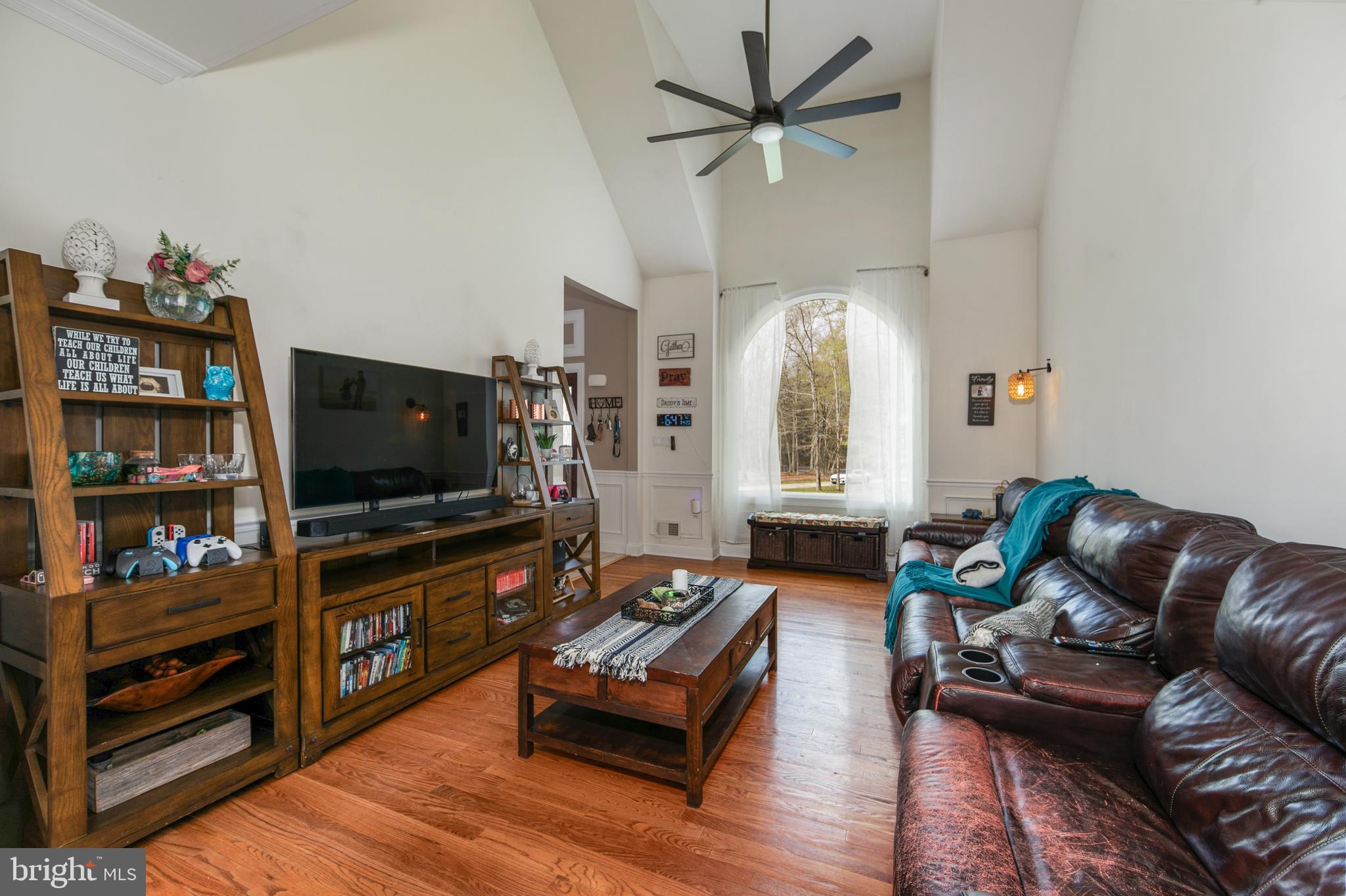 173 West Pleasant Grove Road Jackson, NJ 08527 - Photo 7 of 47 a living room with furniture and a flat screen tv