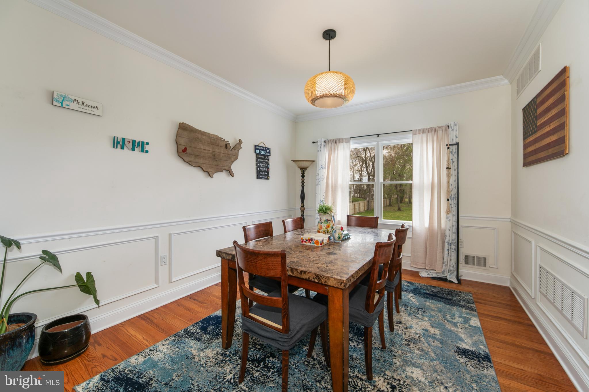 173 West Pleasant Grove Road Jackson, NJ 08527 - Photo 10 of 47 a view of a dining room with furniture and wooden floor