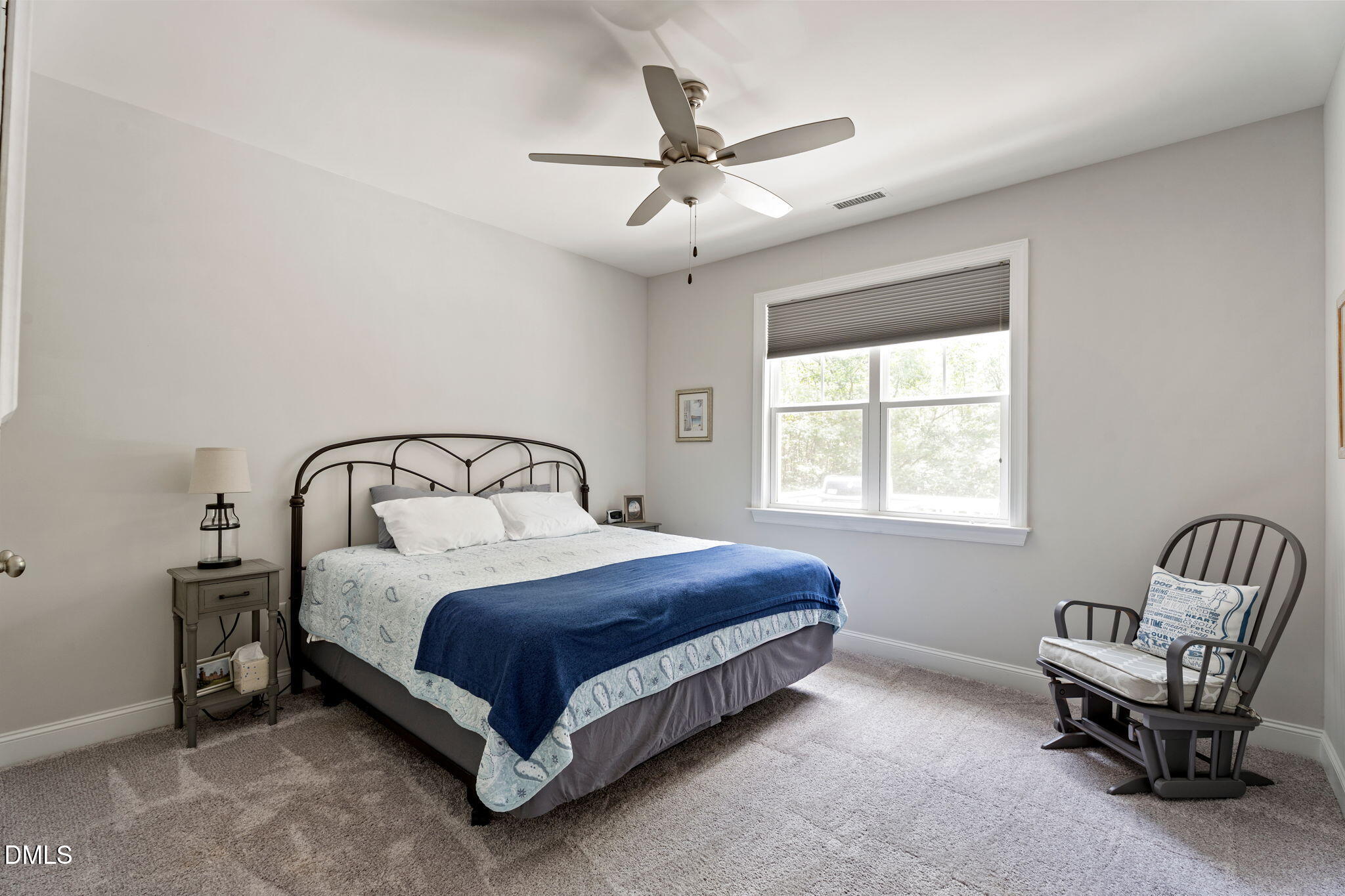 223 Colonial Ridge Drive Pittsboro, NC 27312 - Photo 25 of 47 a bedroom with a bed chair and window
