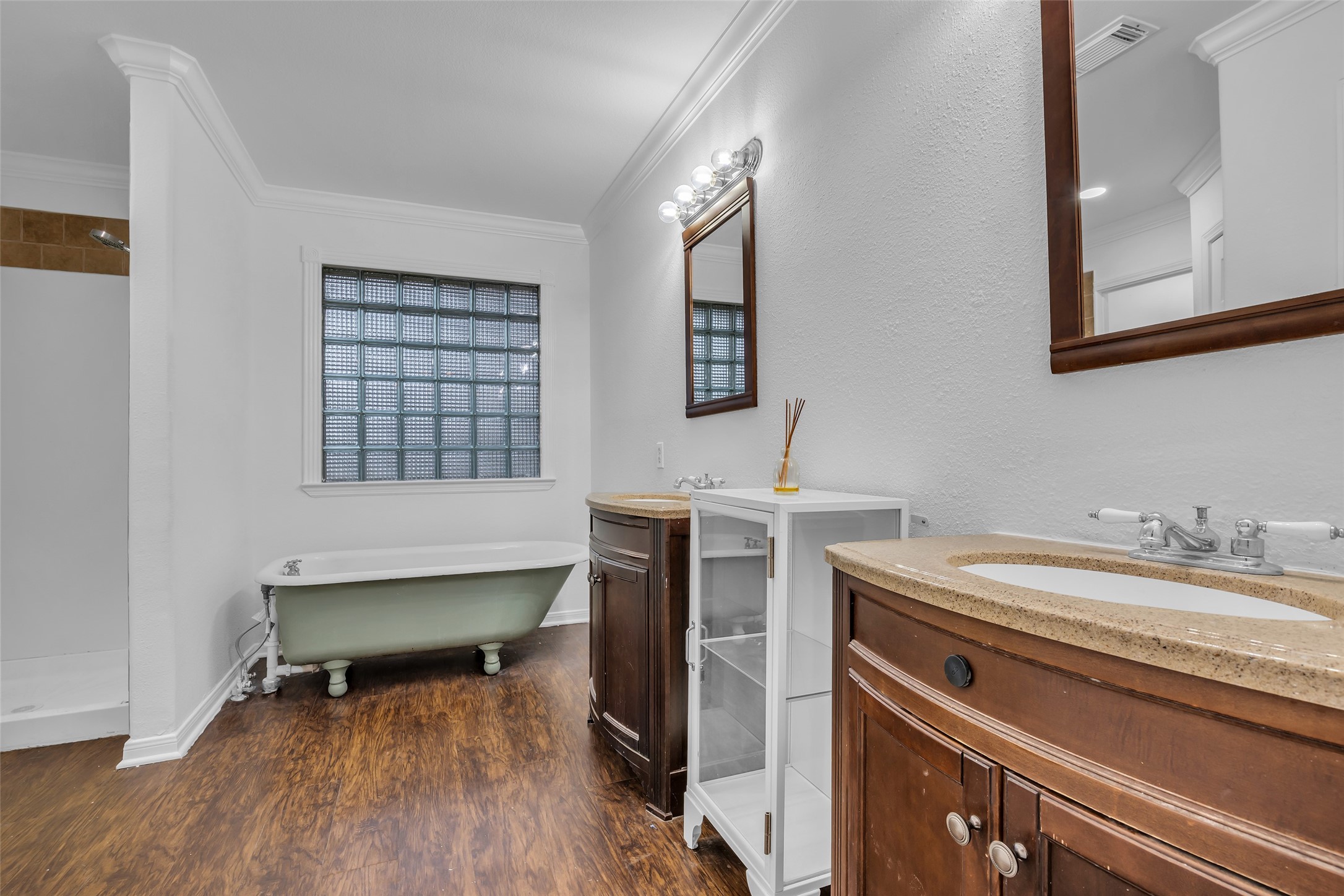 701 Ravensworth Drive Conroe, TX 77302 - Photo 8 of 14 a room with a sink and a mirror