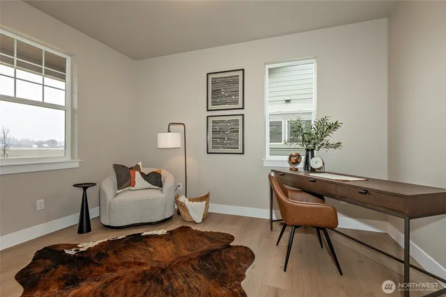a en suite bathroom with a sink a mirror and a shower