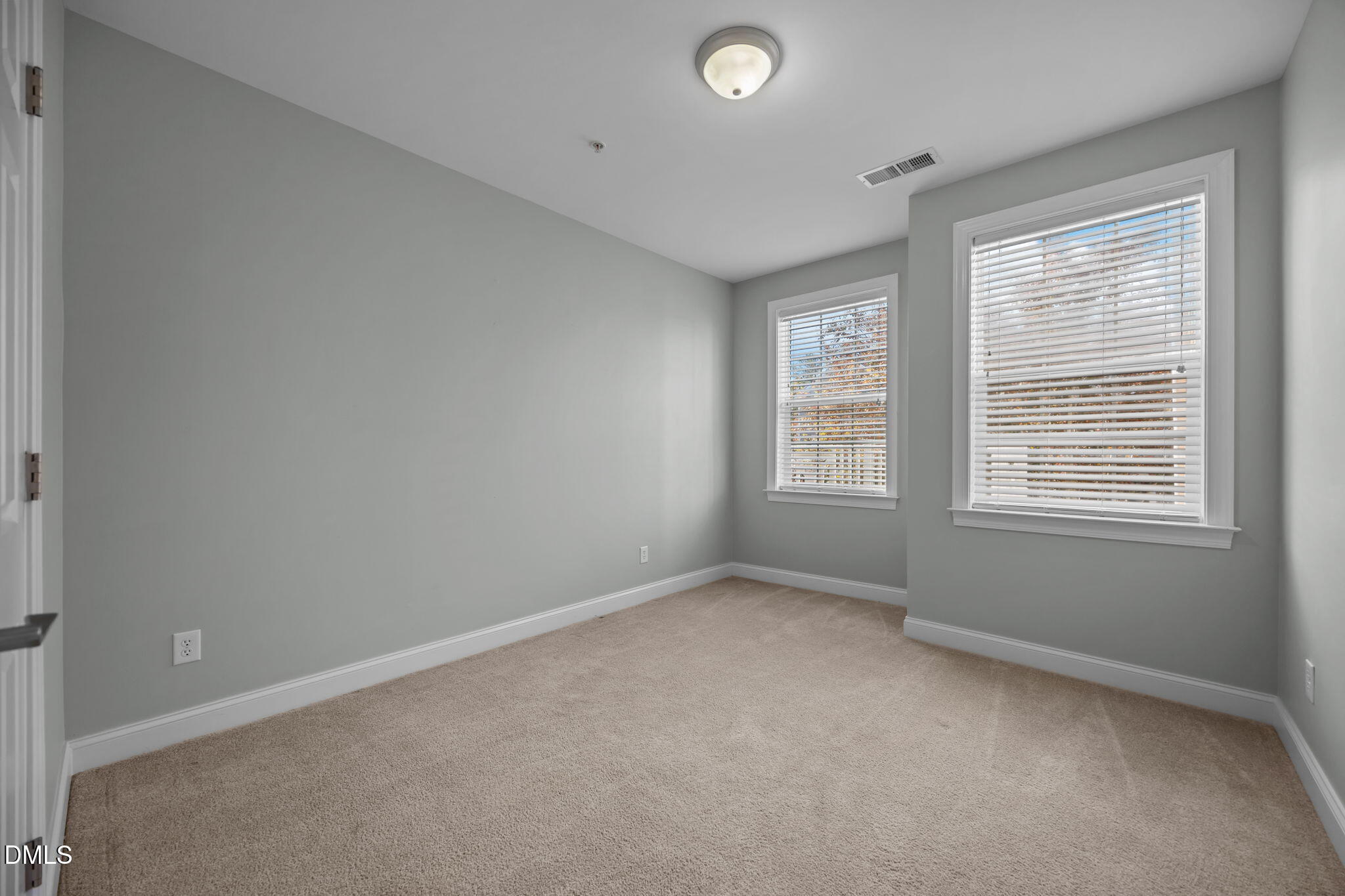 10410 Rosegate Court, Unit 201 Raleigh, NC 27617 - Photo 21 of 46 an empty room with a window
