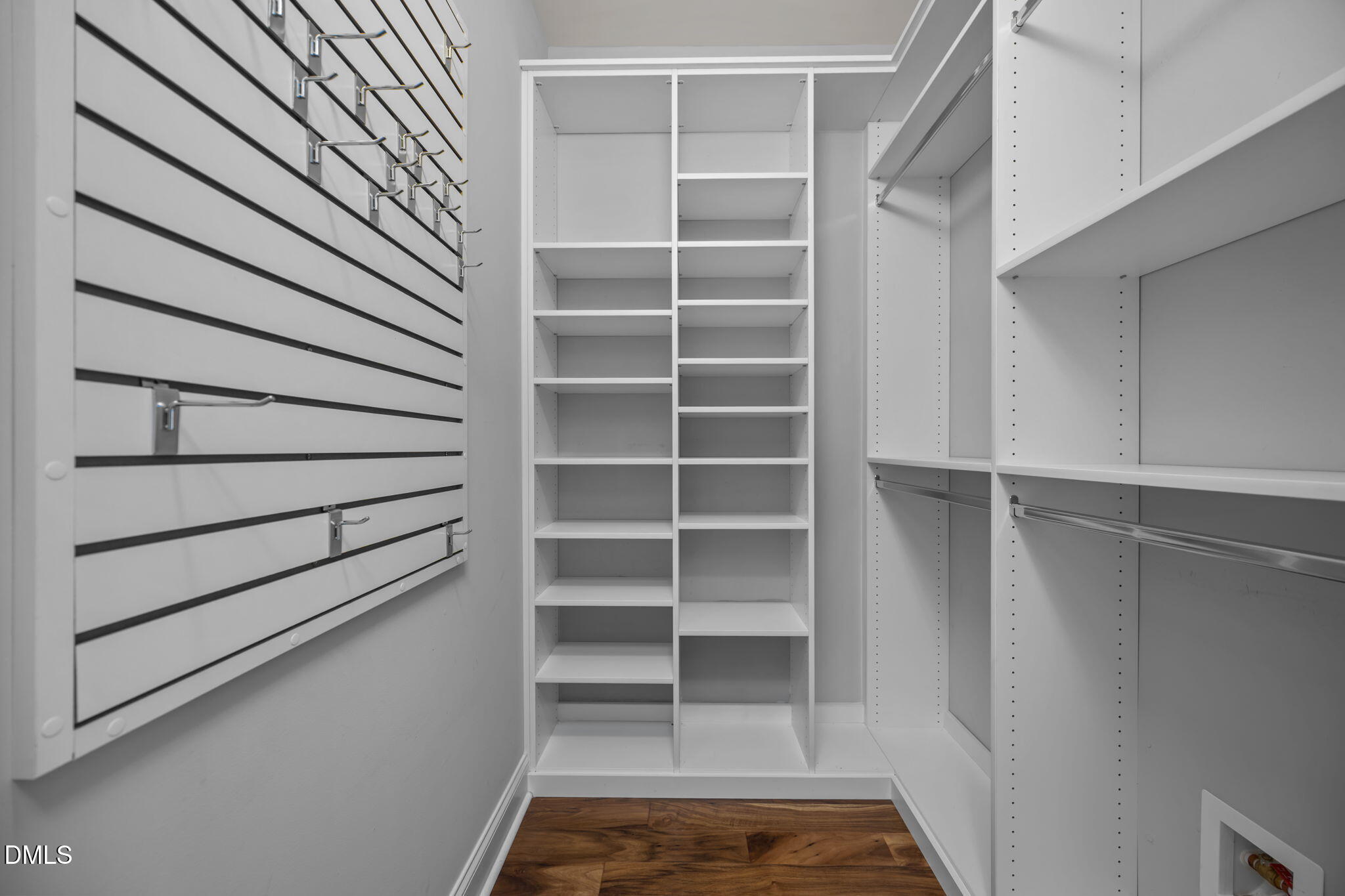 10410 Rosegate Court, Unit 201 Raleigh, NC 27617 - Photo 27 of 46 a view of walk in closet with empty racks