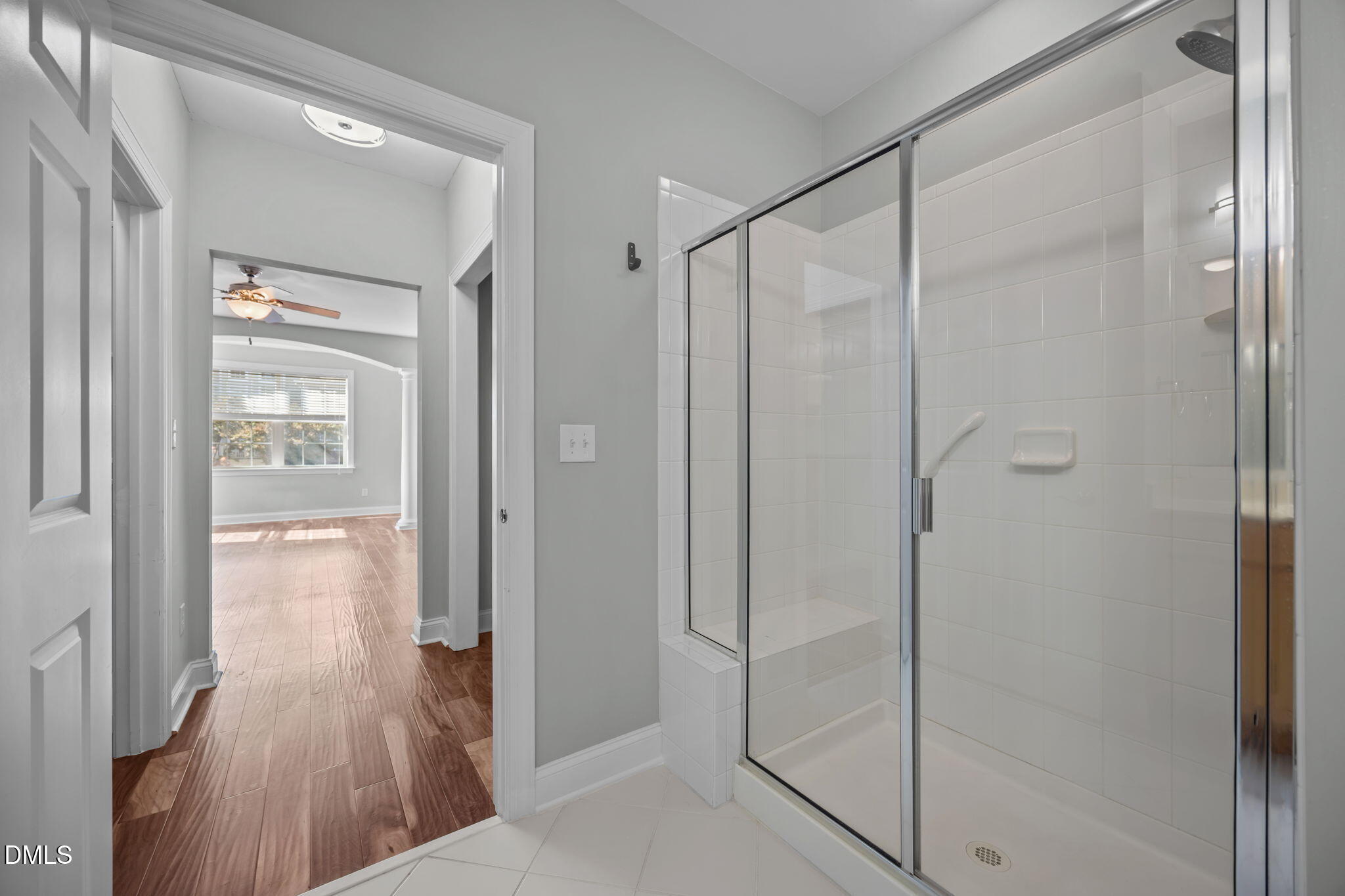 10410 Rosegate Court, Unit 201 Raleigh, NC 27617 - Photo 30 of 46 a bathroom with a shower and a glass door
