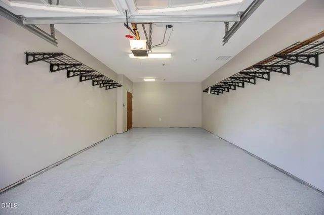 a view of a garage with stairs