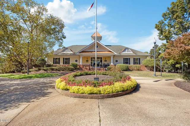 a front view of a house with swimming pool