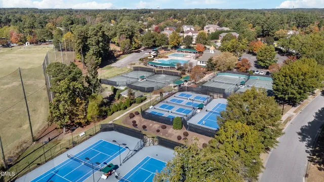 an aerial view of residential house with outdoor space